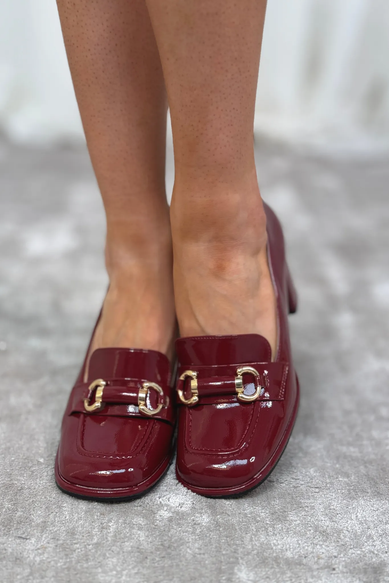 Kelly Gold Buckle Heels In Burgundy